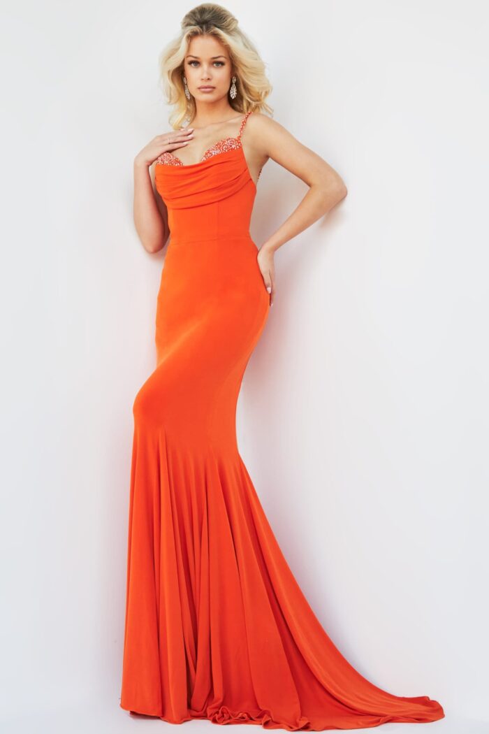 Model wearing Jovani 23201 orange mermaid gown with sweetheart neckline and beaded straps