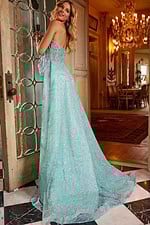 Model wearing Jovani 23361 back view showing train of green gown.