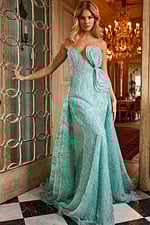 Model wearing Jovani 23361 full-length view of elegant green gown.