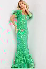 Model wearing Jovani 23383 green dress with deep neckline, front angle view.