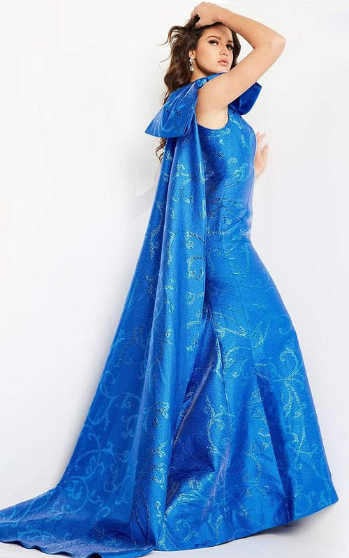 Back view of Jovani 23742 royal blue gown with detailed shoulder drape.