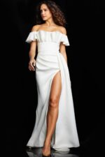 Model wearing Jovani 23402 white dress with ruffled off-shoulder and high slit front view