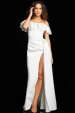 Model wearing Jovani 23402 white dress with off-the-shoulder ruffles and high slit front view