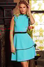 Model wearing Jovani 23521 blue dress with high neckline and layered skirt.