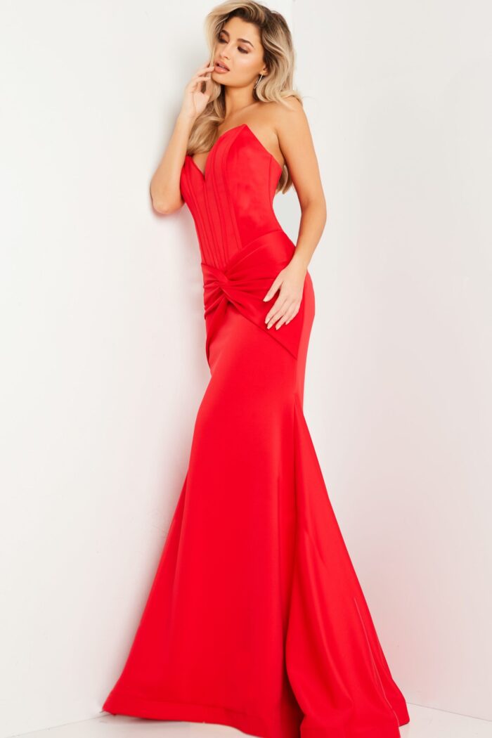 Model showcasing Jovani 23556 elegant red mermaid dress, front perspective.
