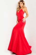 Model wearing Jovani 23556 elegant red mermaid dress, front view.