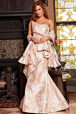 Model wearing Jovani 23624 gold mermaid gown with floral detail, another front view