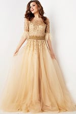 Model in Jovani 23629 highlighting the gown's feathered sleeve details.