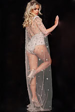 Back view of Jovani 23650 nude bodysuit with sheer cape.