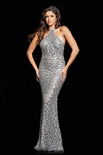 Model wearing Jovani 23652 silver long dress with halter neckline and crystal embellishments, full frontal view.