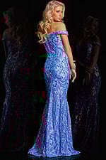 Model wearing Jovani 23675, back view highlighting the off-the-shoulder sleeves and fitted silhouette.