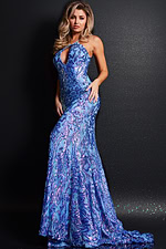 Model wearing Jovani 23676 blue gown with halter neckline and keyhole design.