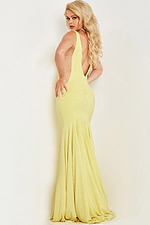 Model wearing Jovani 23701 yellow dress front view