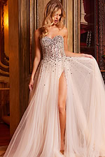 Model wearing Jovani 23712 nude dress, showcasing sweetheart neckline and full-length silhouette.