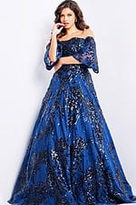 Model wearing Jovani 23765 navy dress, back view with shimmering sequin details.