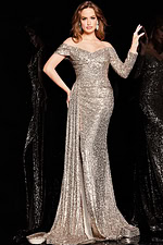 Model wearing Jovani 23779 gold off-the-shoulder gown with sequins and high slit