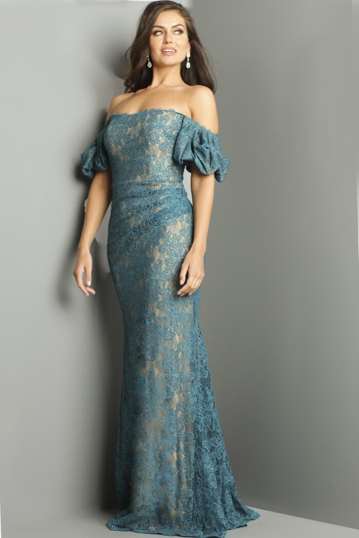 Model wearing Jovani 23813 navy gown with a floor-length design