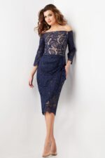 model wearing Jovani 23814 navy lace dress, front view with detail