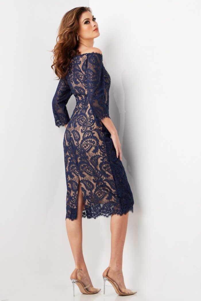 model wearing Jovani 23814 navy lace dress, back view