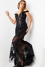 Model showcasing Jovani 23834 black gown side pose