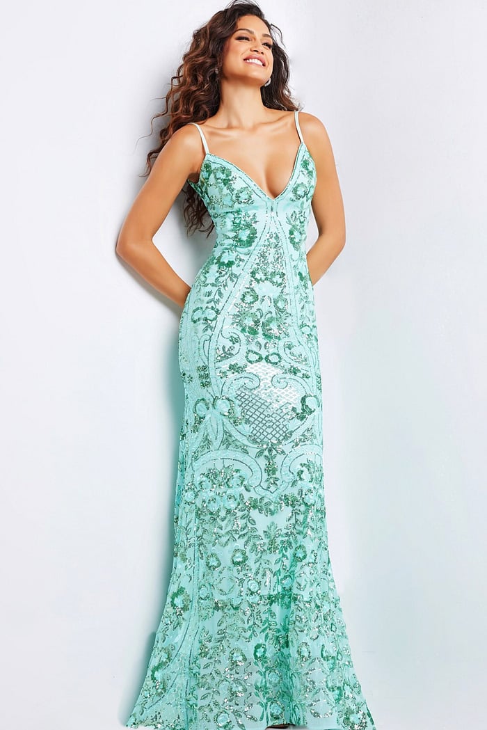 Model wearing Jovani 23839 green gown, showcasing front details with sequins.