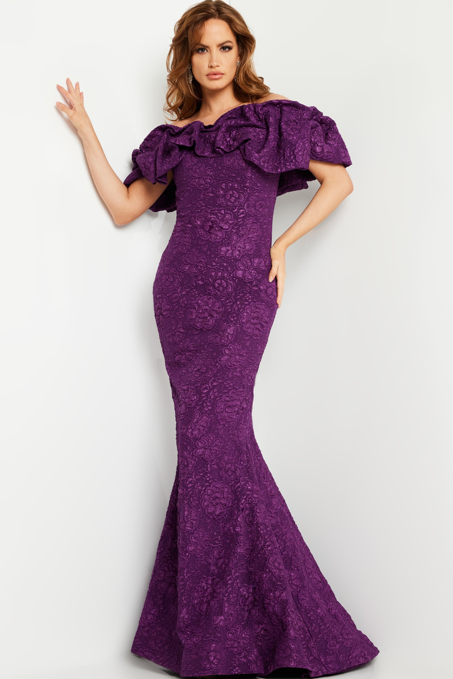 23847-PLUM-209.jpg Model wearing Jovani 23847 purple gown with ruffled neckline and mermaid silhouette