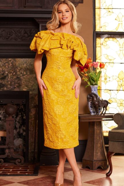 Model wearing Jovani 23848 yellow dress, full-length frontal view, showcasing floral texture and ruffles.