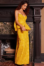 Model wearing Jovani 23849 side view of yellow gown with peplum waist and sweetheart neckline.