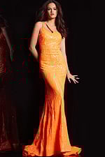 Model in Jovani 23852 orange gown with sequin details front view