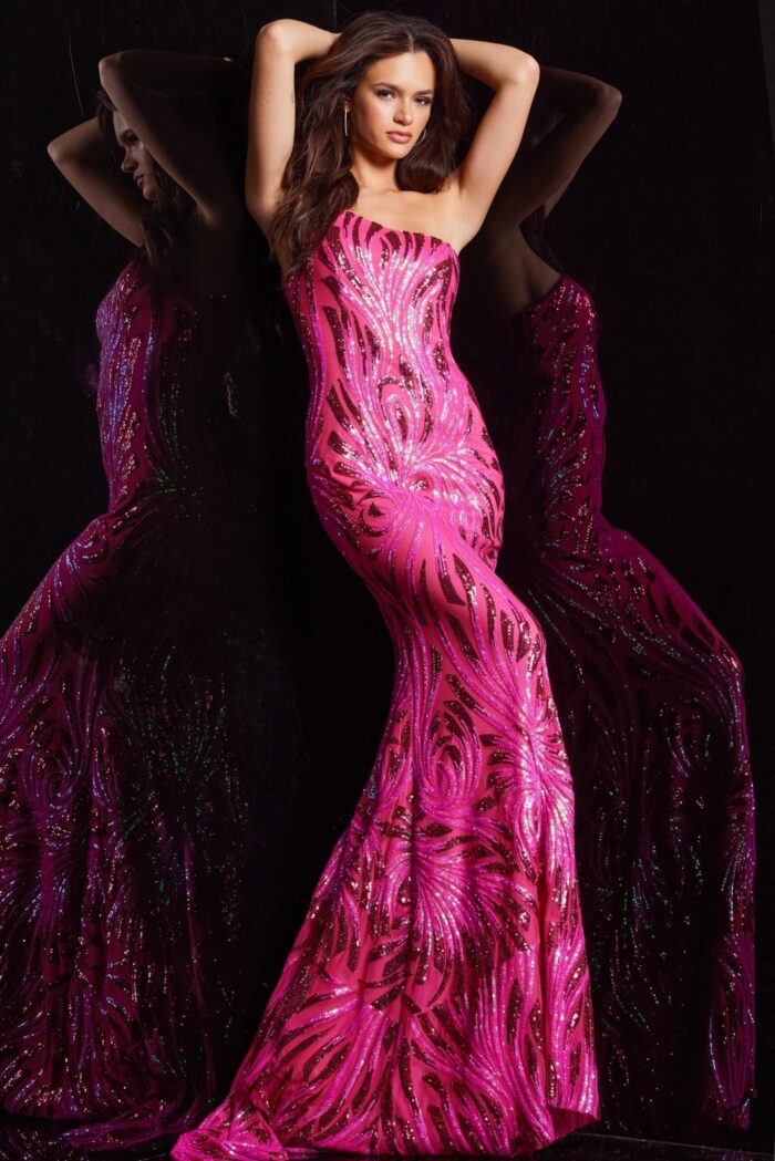 Model wearing Jovani 23876 in pink, front view highlighting strapless design.