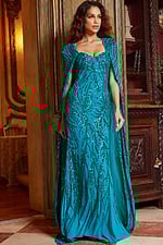 Front view of model wearing Jovani 23891 blue gown with sequins