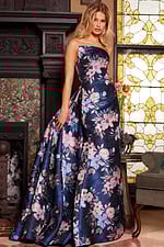 Model wearing Jovani 23893 strapless floral gown with A-line silhouette from the front.