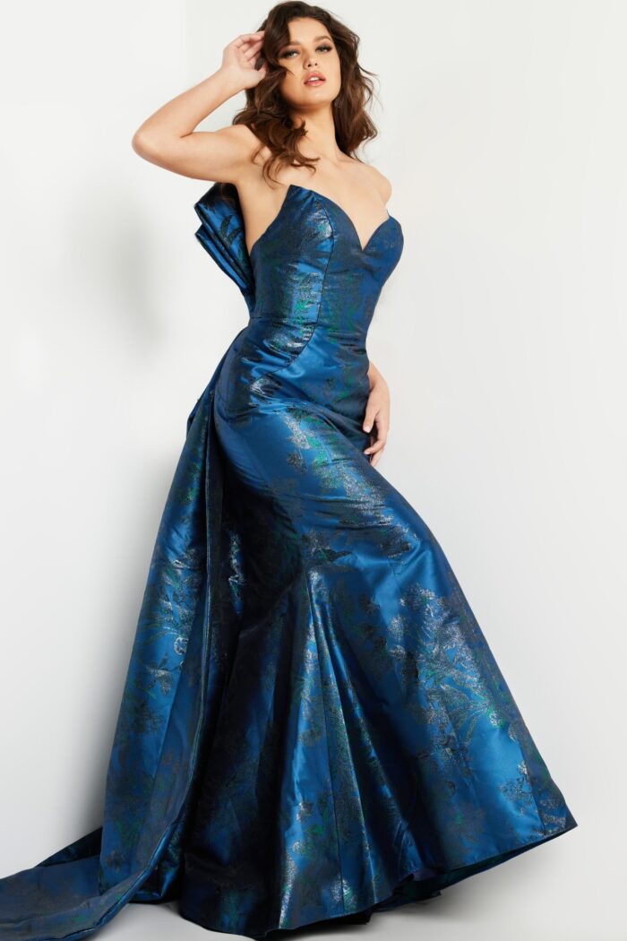 Model wearing Jovani 23898 navy dress with sweetheart neckline and fitted silhouette.