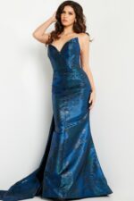 Model showcasing Jovani 23898 navy dress with detailed fabric textures.