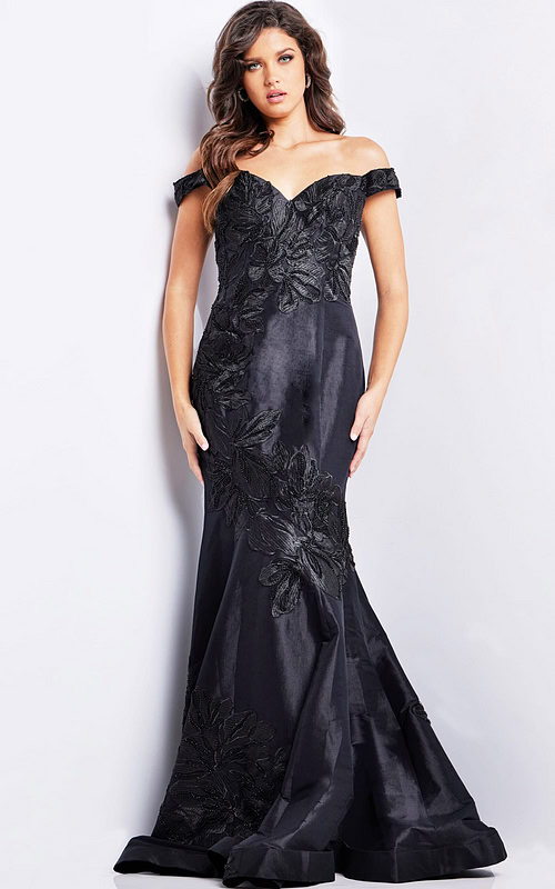 Model wearing Jovani 23928 black dress with off-the-shoulder neckline, front view.