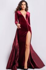 Model wearing Jovani 23943 burgundy gown, front view, showcasing the high slit and elegant silhouette.