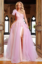 Model wearing Jovani 23951 pink dress with floral appliqués and high slit
