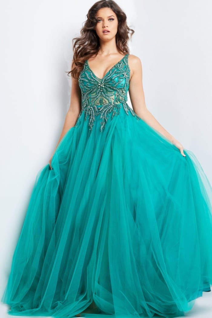 Model wearing Jovani 23962 emerald gown, another front view showcasing the beadwork.