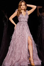 Model in Jovani 24000 purple dress featuring a high slit and elegant beadwork.