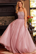 model wearing Jovani 24051 blush ballgown with beaded bodice and full skirt