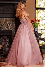 back view of model in Jovani 24051 blush ballgown