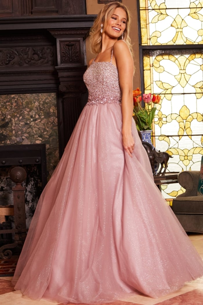 side view of model wearing Jovani 24051 blush ballgown