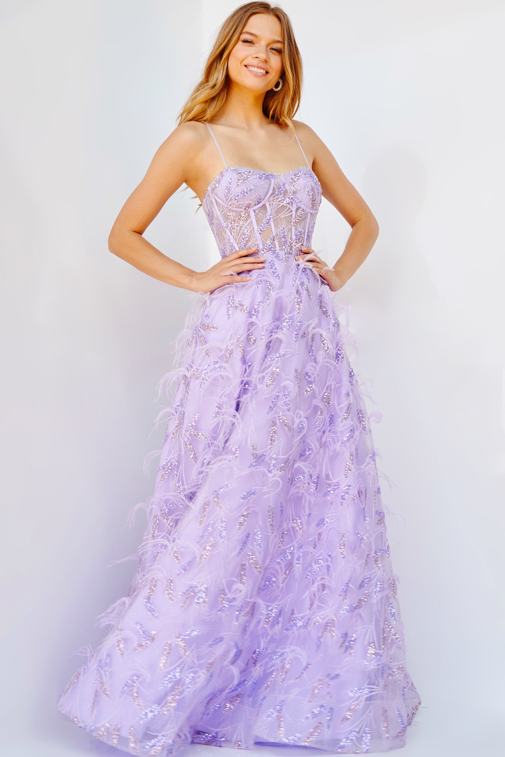 24078-LILAC-202.jpg Model wearing Jovani 24078 lilac dress with a sweetheart neckline and feather embellishments from the front view.
