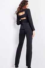 model wearing 24119 black jumpsuit with back cutout design