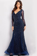 Model wearing Jovani 24236 navy dress with V-neckline and long sleeves.