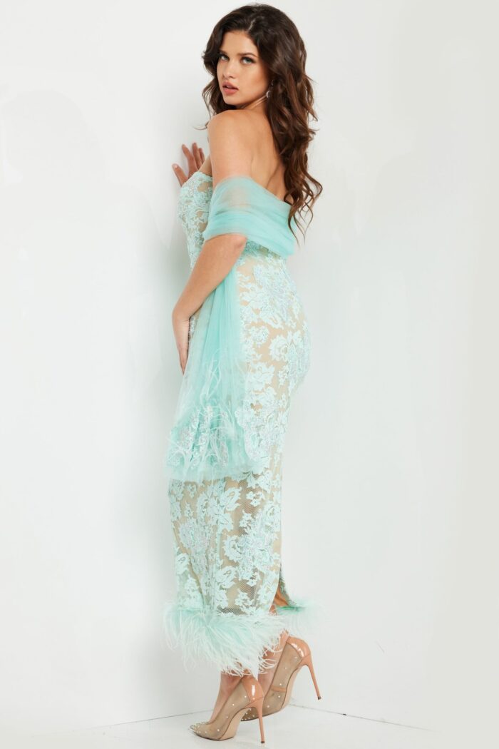 Back view of Jovani 24256 aqua dress highlighting fitted silhouette and lace embroidery