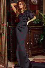 Elegant pose in Jovani 24279 black dress with floral neckline