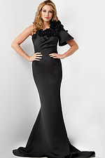 Model wearing Jovani 24279 black dress with asymmetrical floral design
