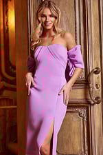 Model in Jovani 38078 lilac dress showcasing front slit and off-shoulder design.
