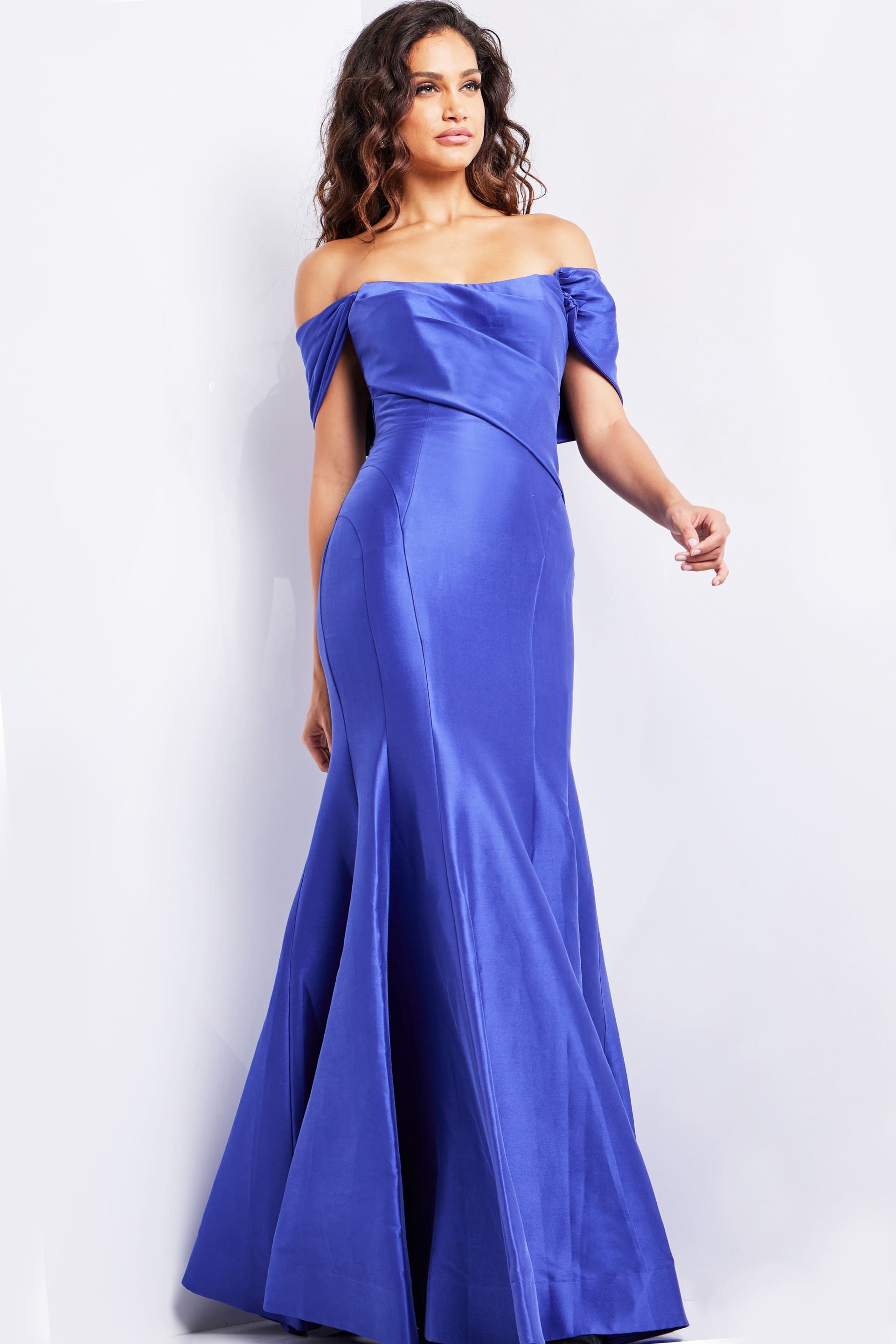 24283_PURPLE_19-2.jpg model wearing Jovani 24283 purple off-the-shoulder mermaid silhouette dress, front view